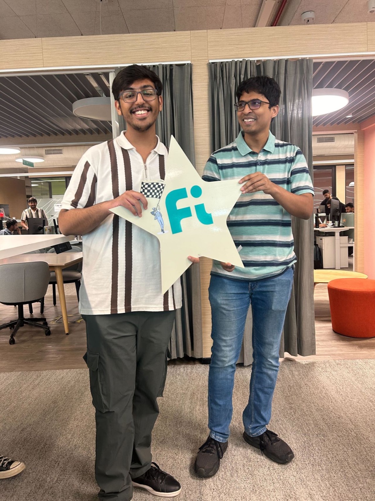 Harshit receiving the Fi Star recognition at the Fi Money office
